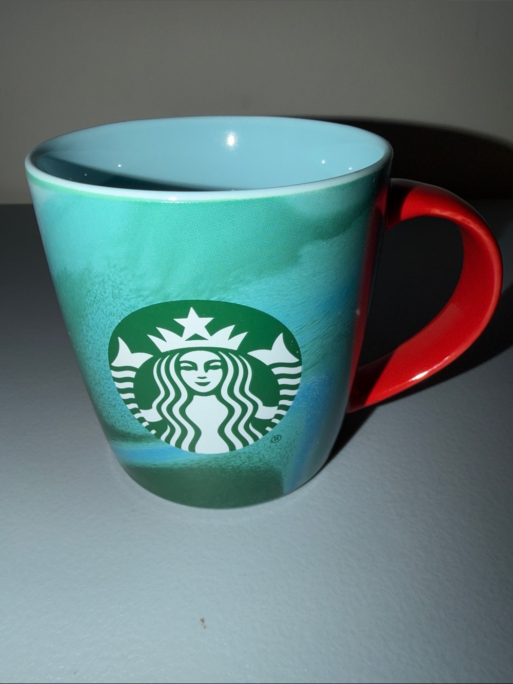 Starbucks Holiday Edition Teal Swirl Mug with Red Handle